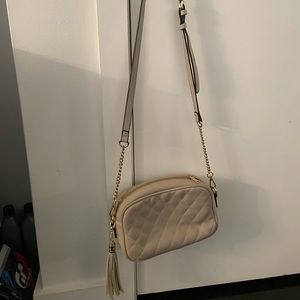 Beige purse. No tears or rips